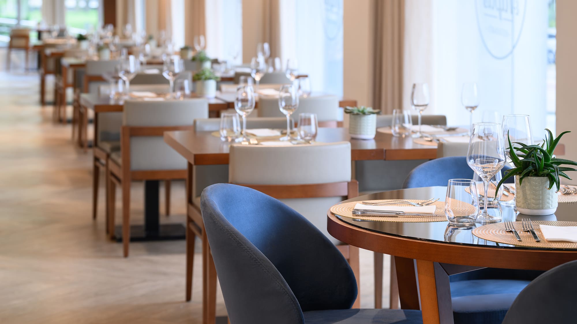 a restaurant with tables and chairs