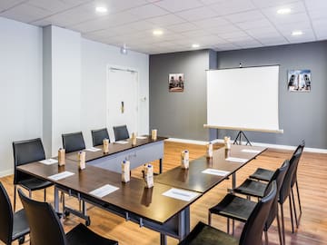 a room with a table and chairs