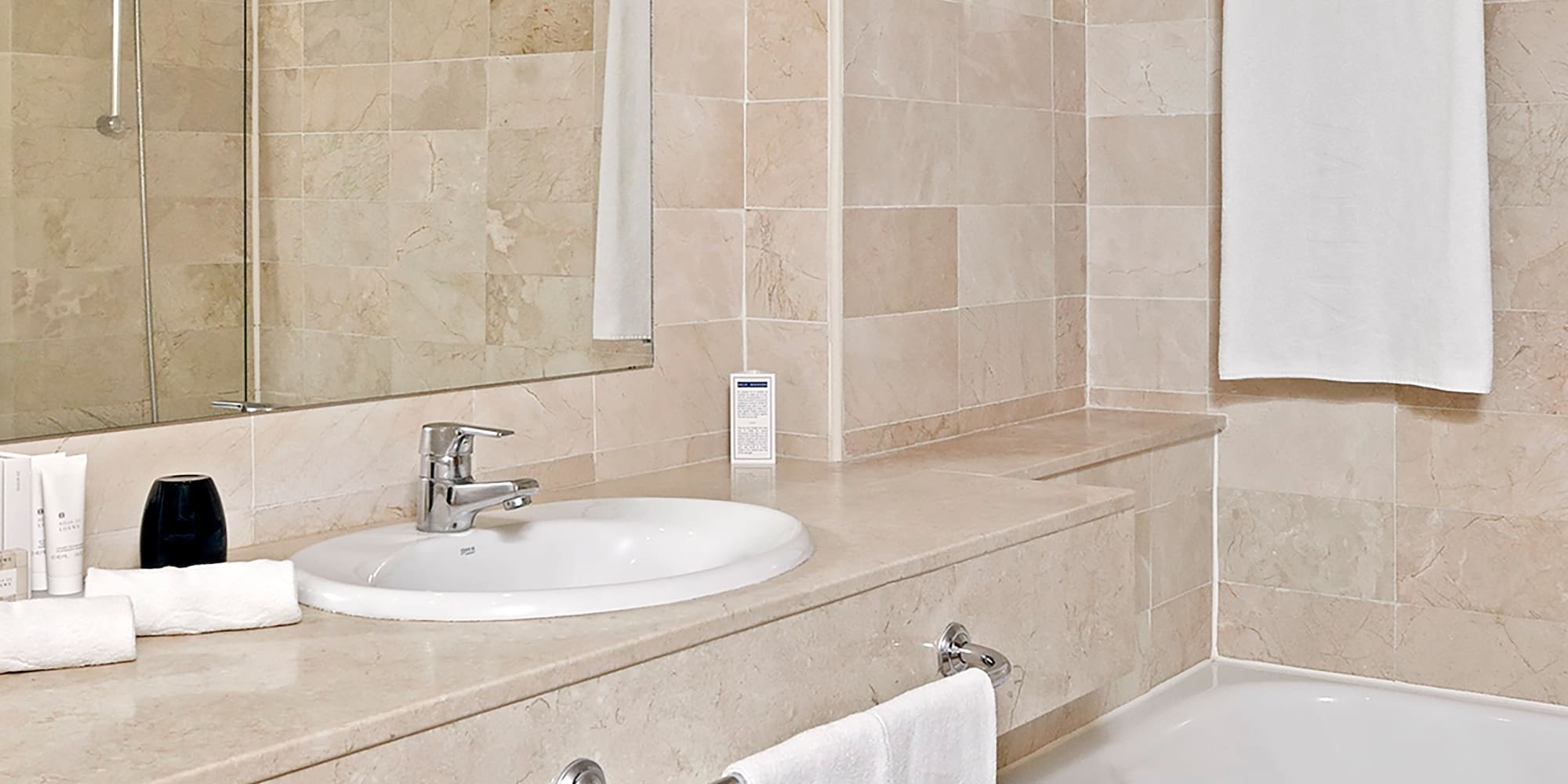 a bathroom with a sink and bathtub