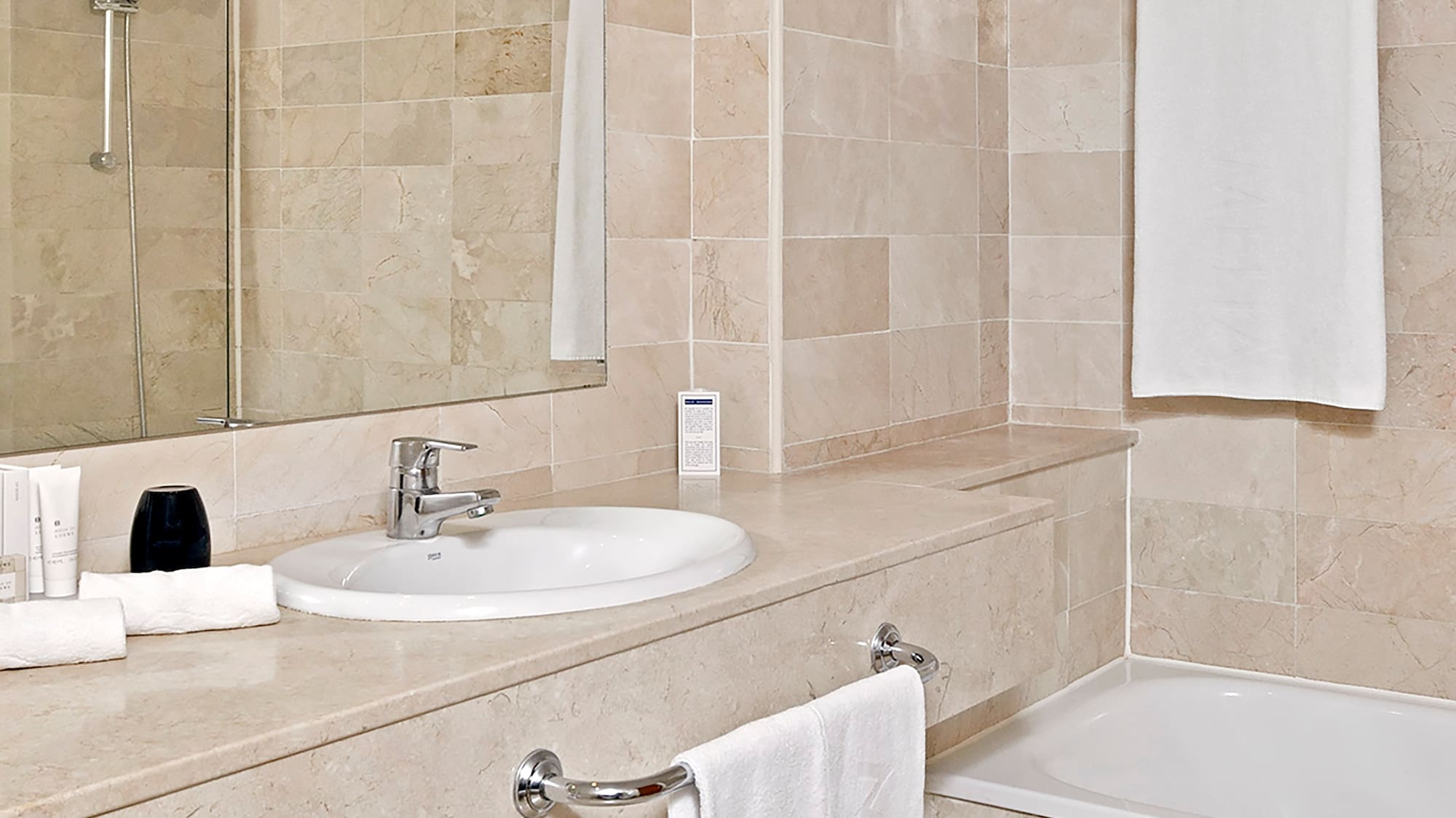 a bathroom with a sink and bathtub