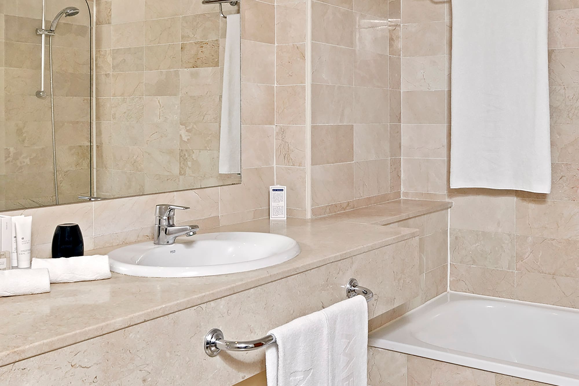 a bathroom with a sink and bathtub