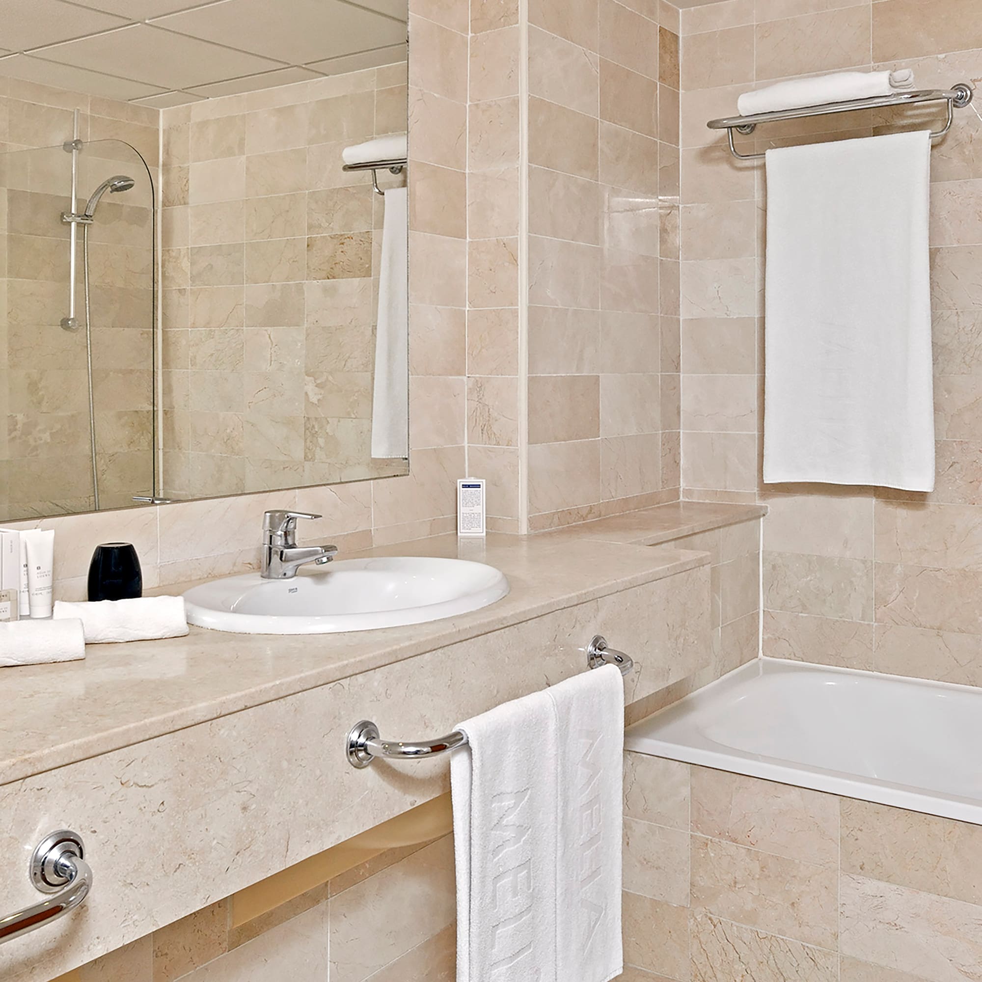 a bathroom with a sink and bathtub
