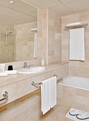 a bathroom with a sink and bathtub