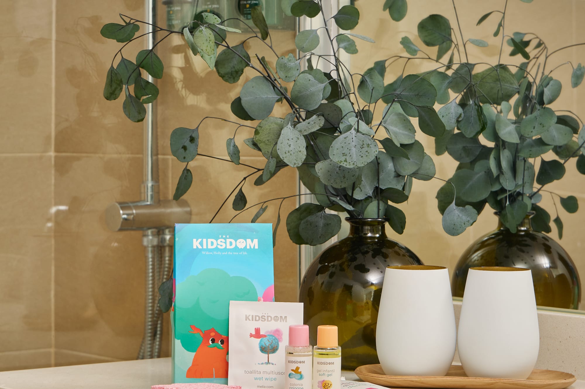 a bathroom counter with a couple of white objects on it