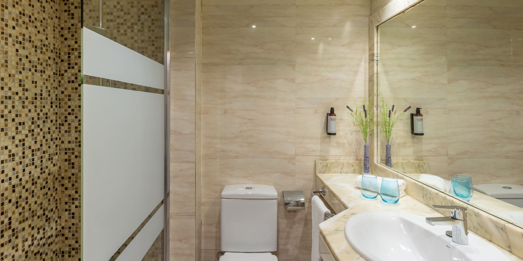 a bathroom with a sink and toilet