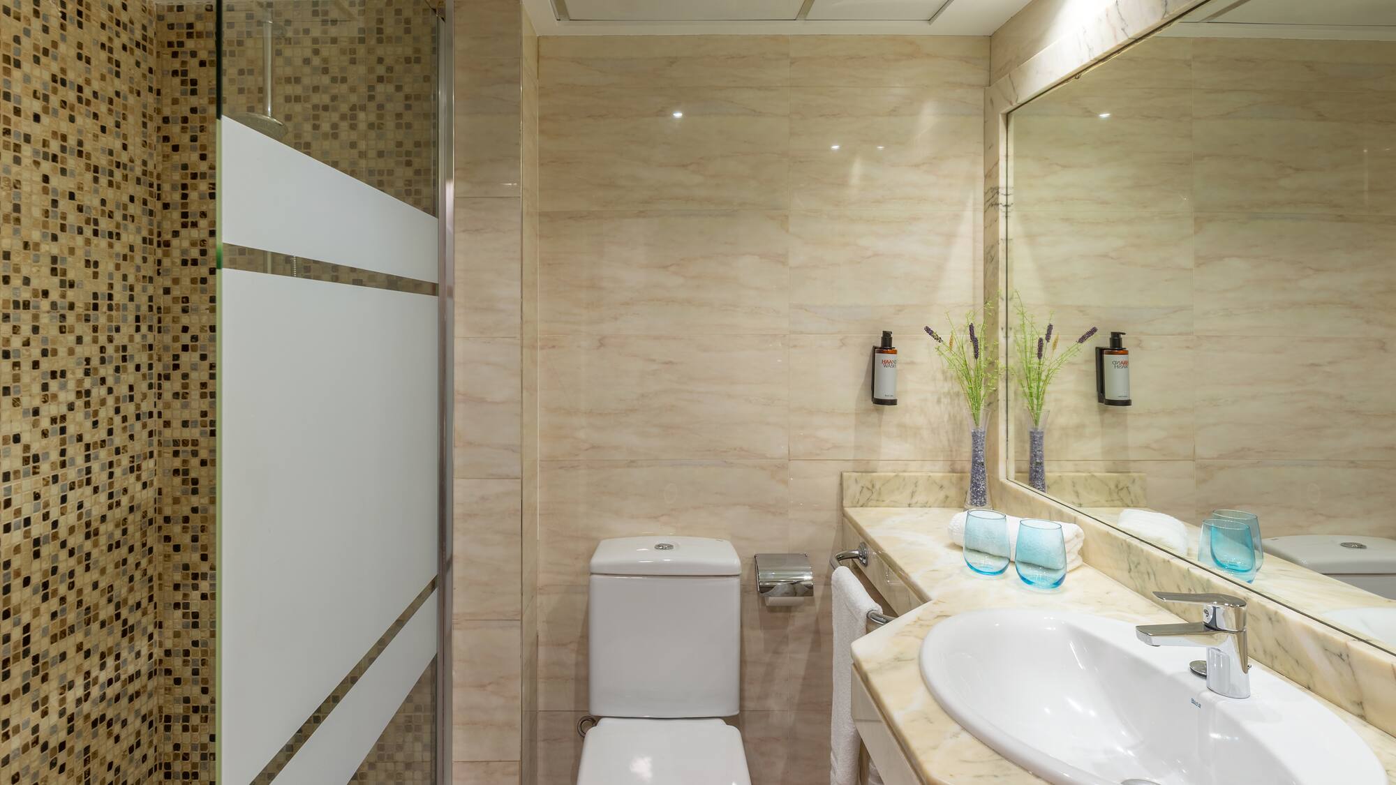 a bathroom with a sink and toilet