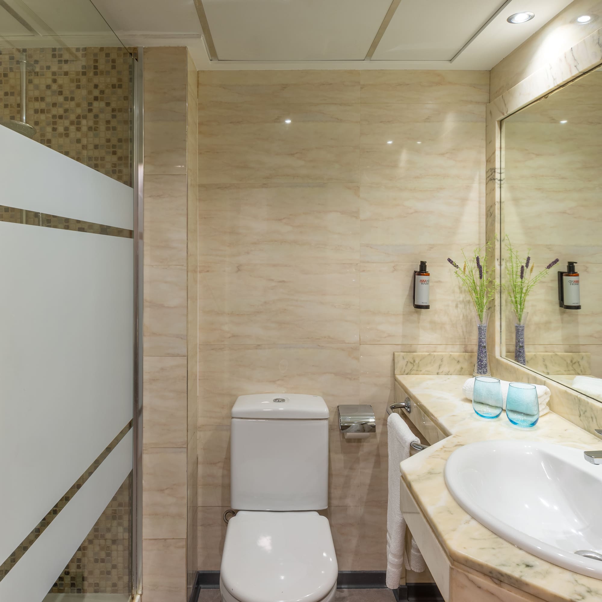 a bathroom with a sink and toilet