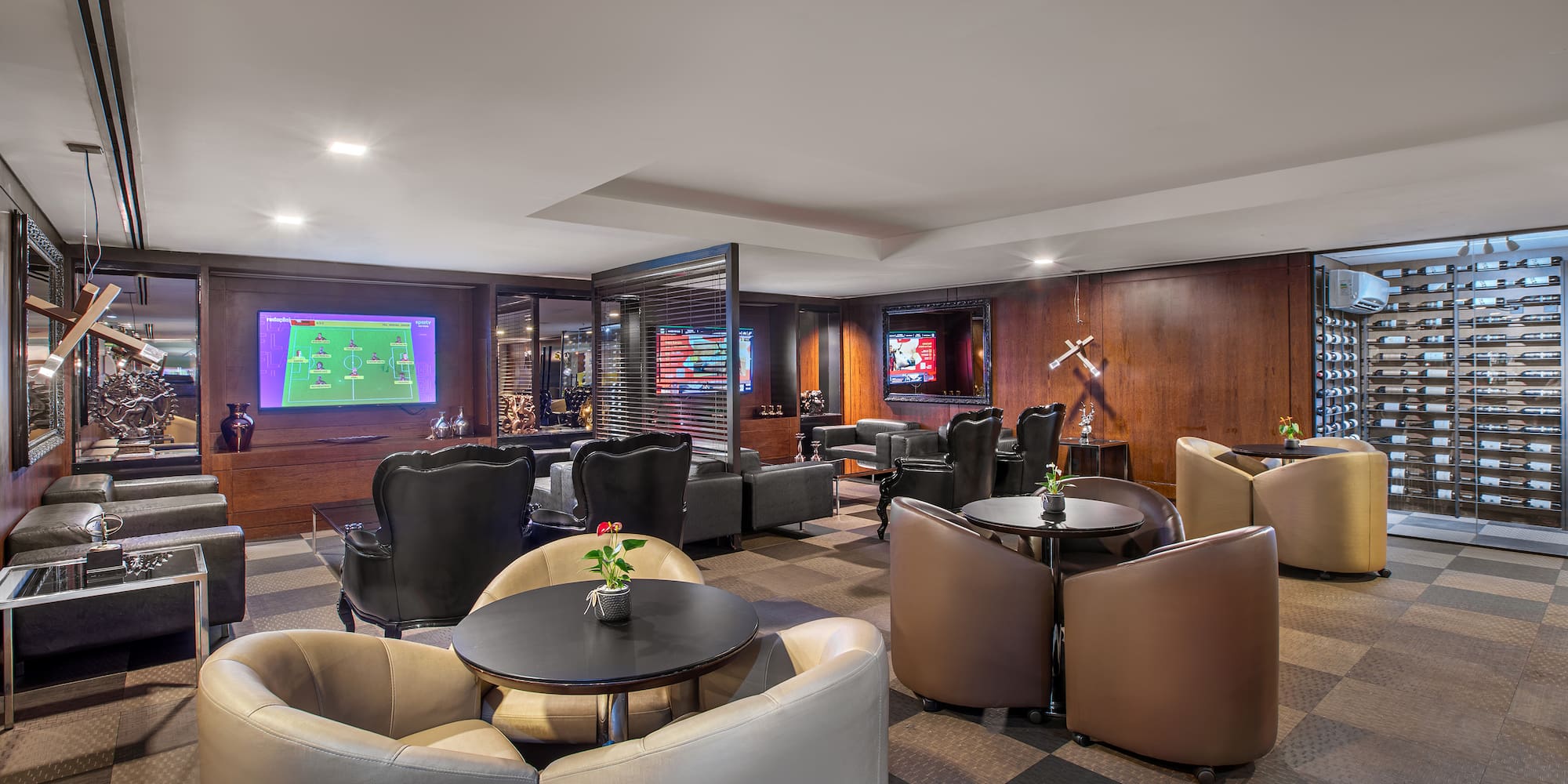 a room with a television and tables