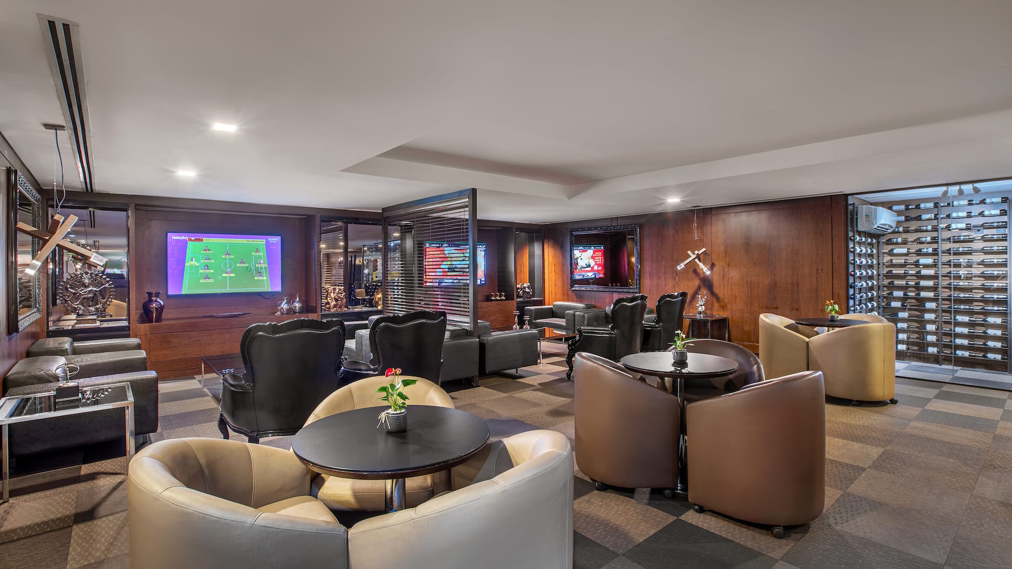 a room with a television and tables