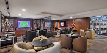 a room with a television and tables