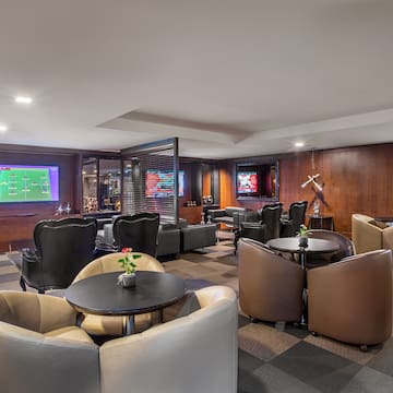 a room with a television and tables