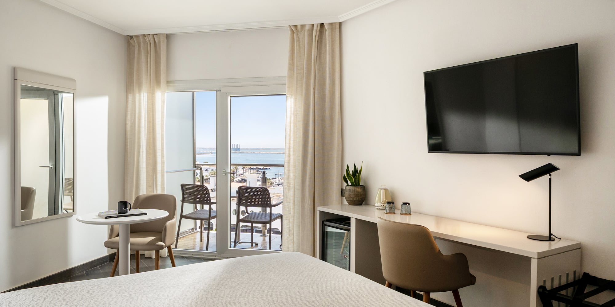 a room with a television and table