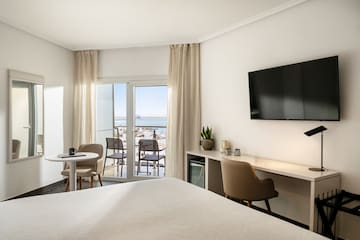 a room with a television and table