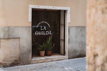 a window with a sign on the side of a building