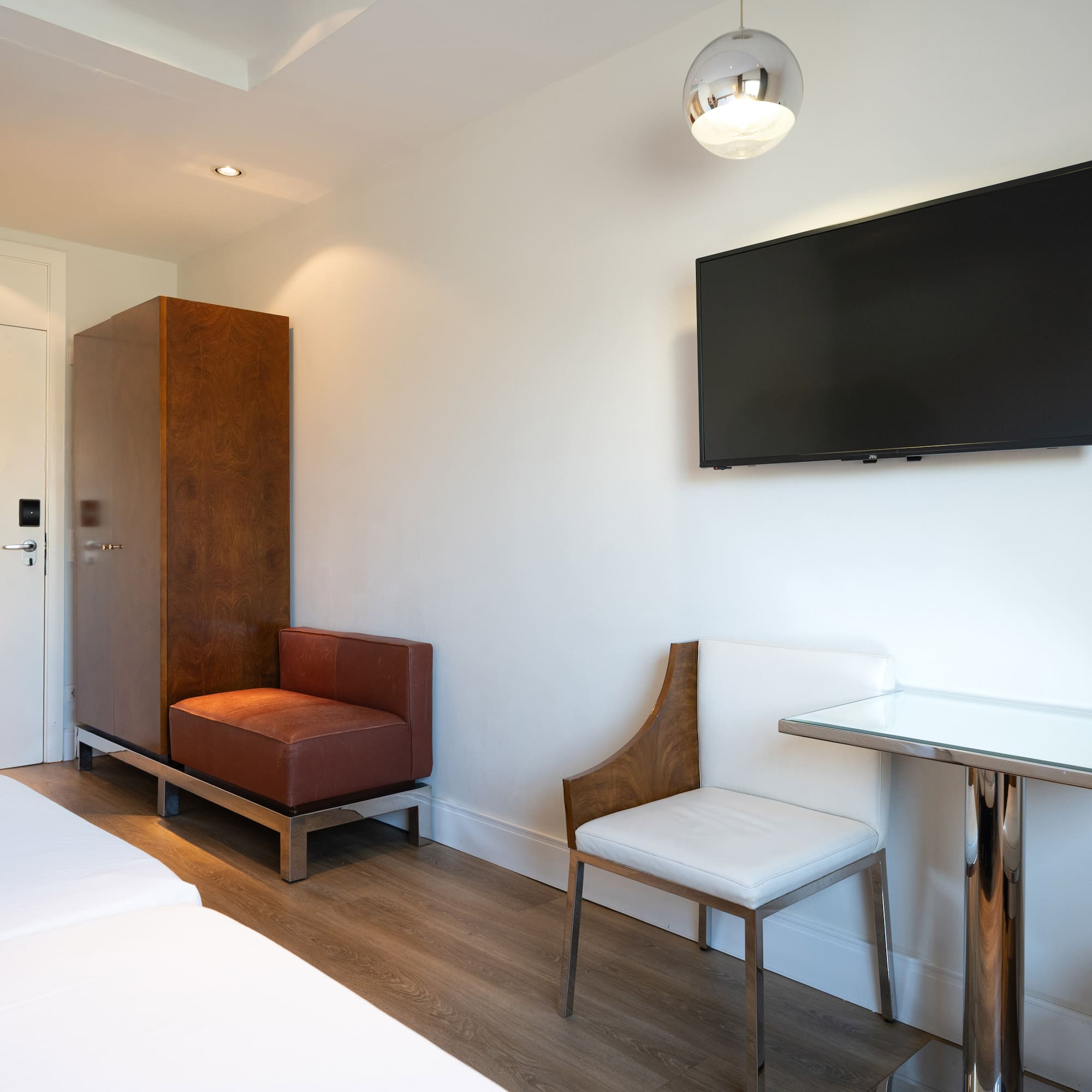 a room with a tv on the wall