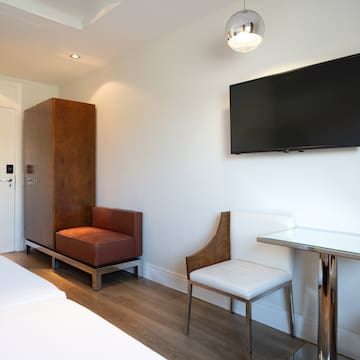 a room with a tv on the wall