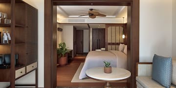 a room with a bed and a table