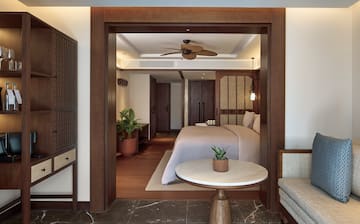 a room with a bed and a table