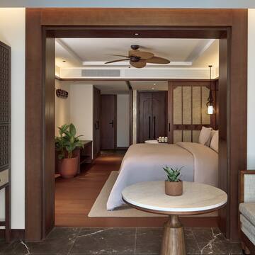 a room with a bed and a table