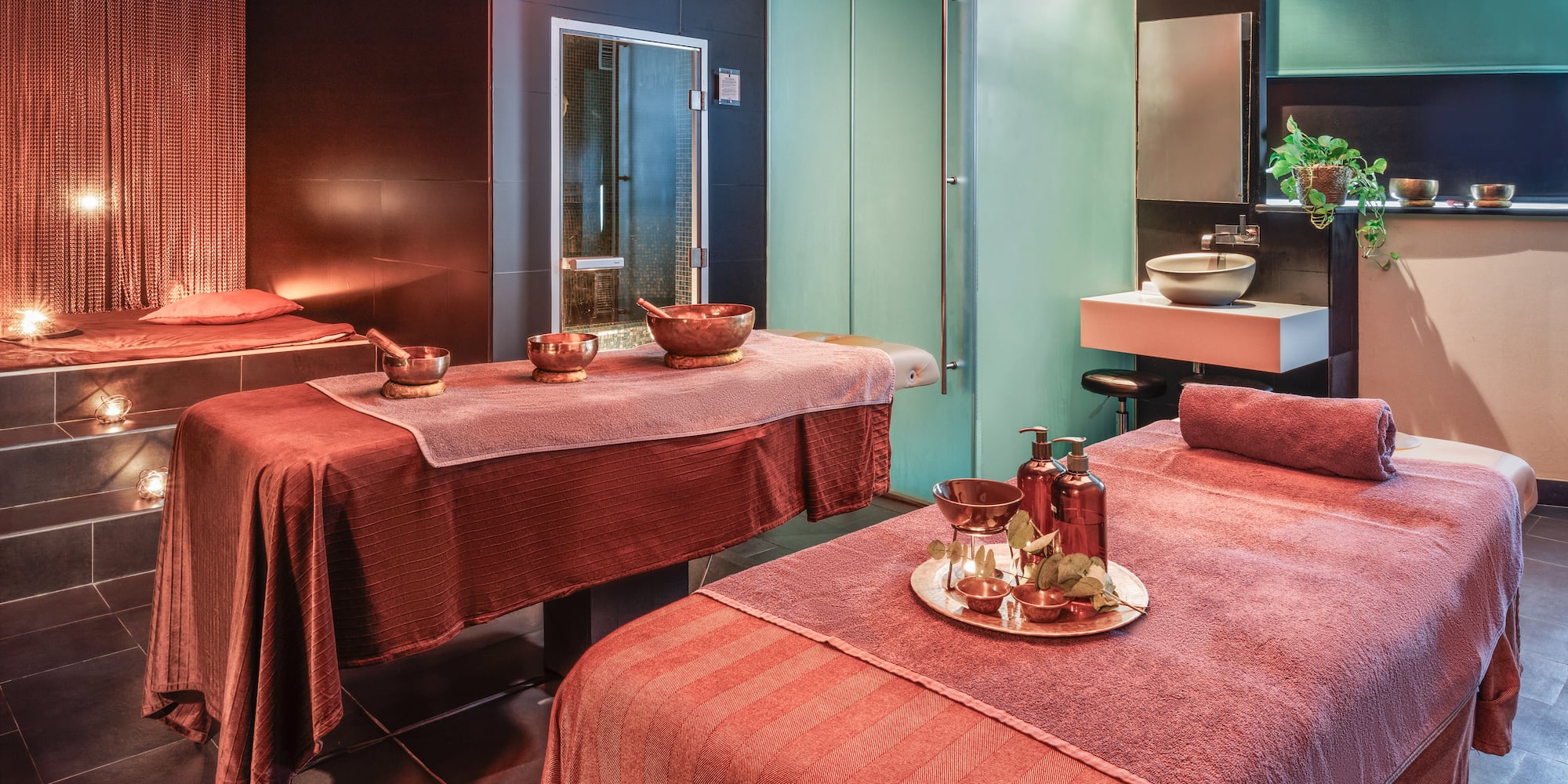 a room with beds and towels