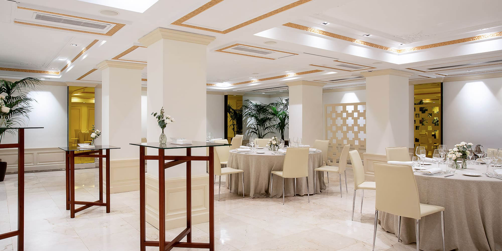 a room with tables and chairs