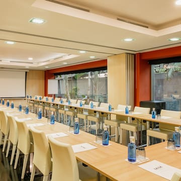 a room with tables and chairs