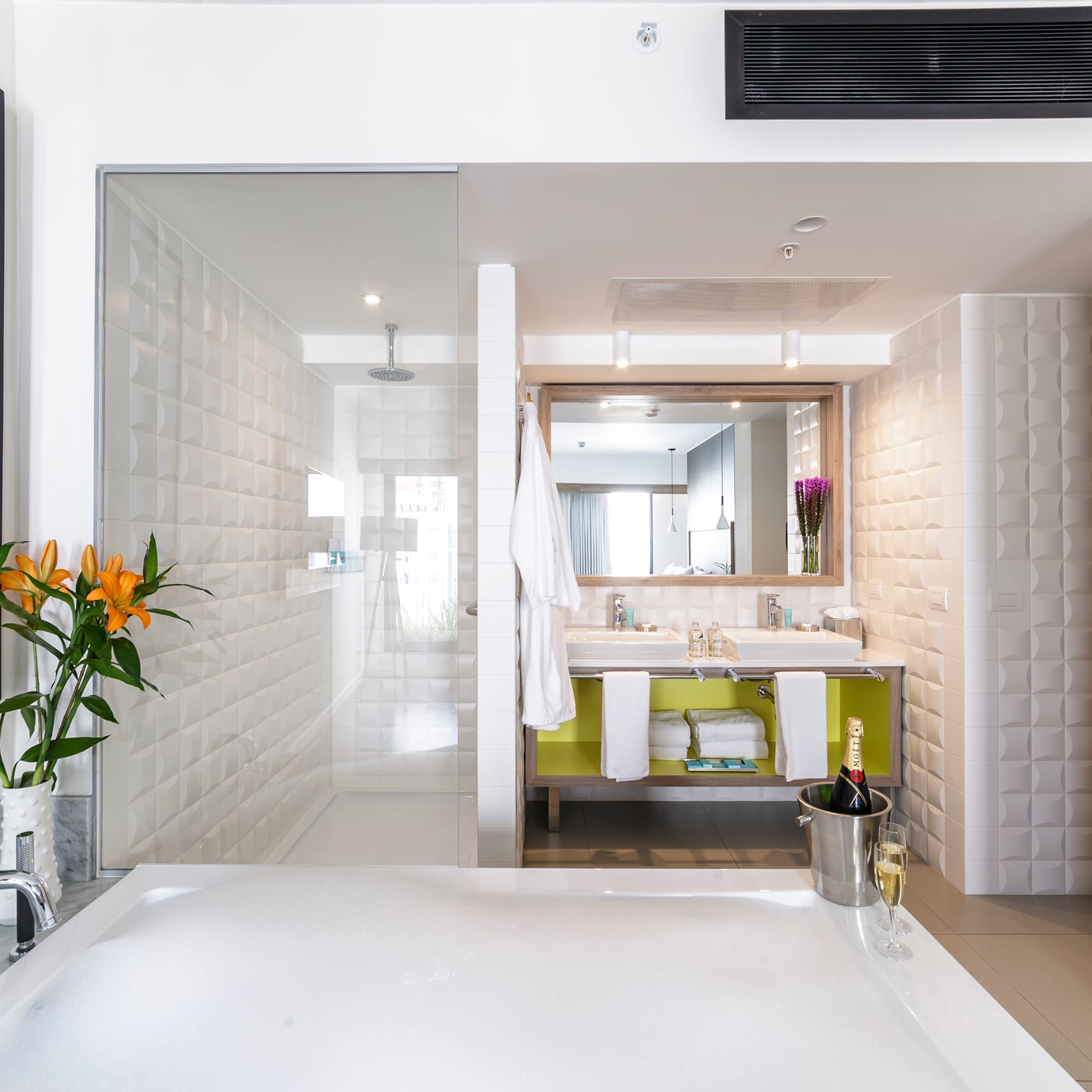 a bathroom with a glass door