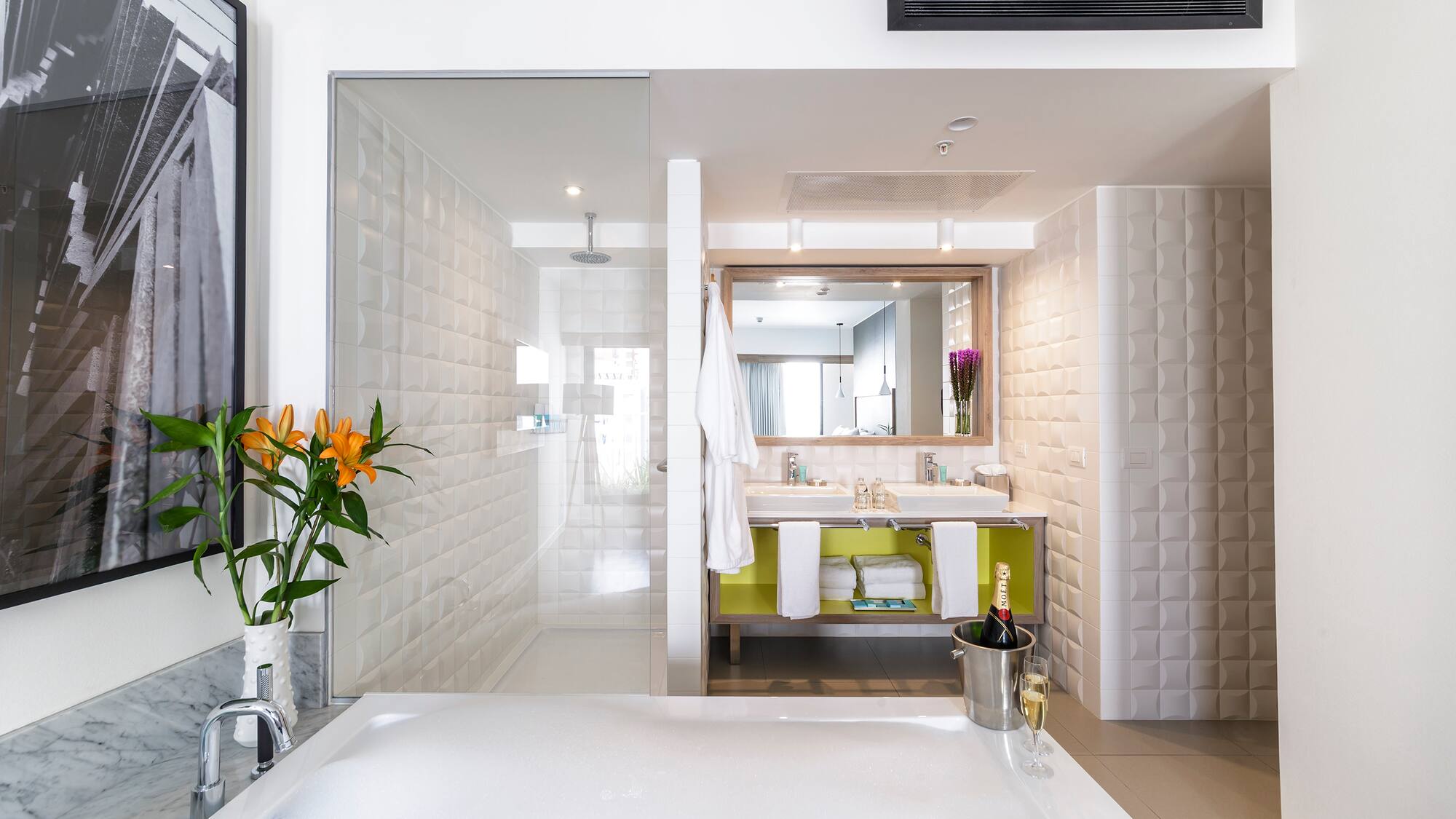 a bathroom with a glass door