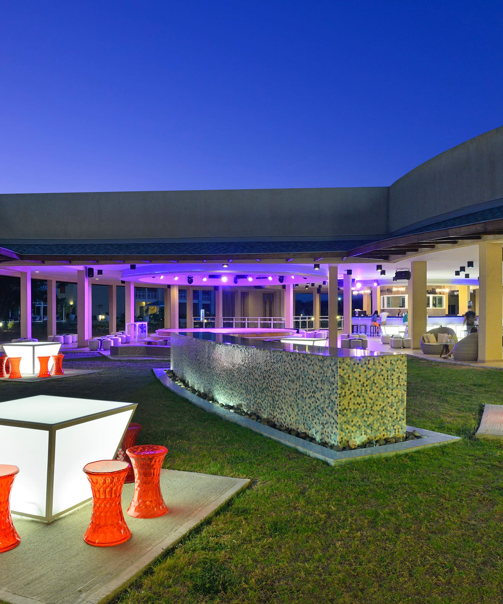 a building with a large patio and a large building with a large patio