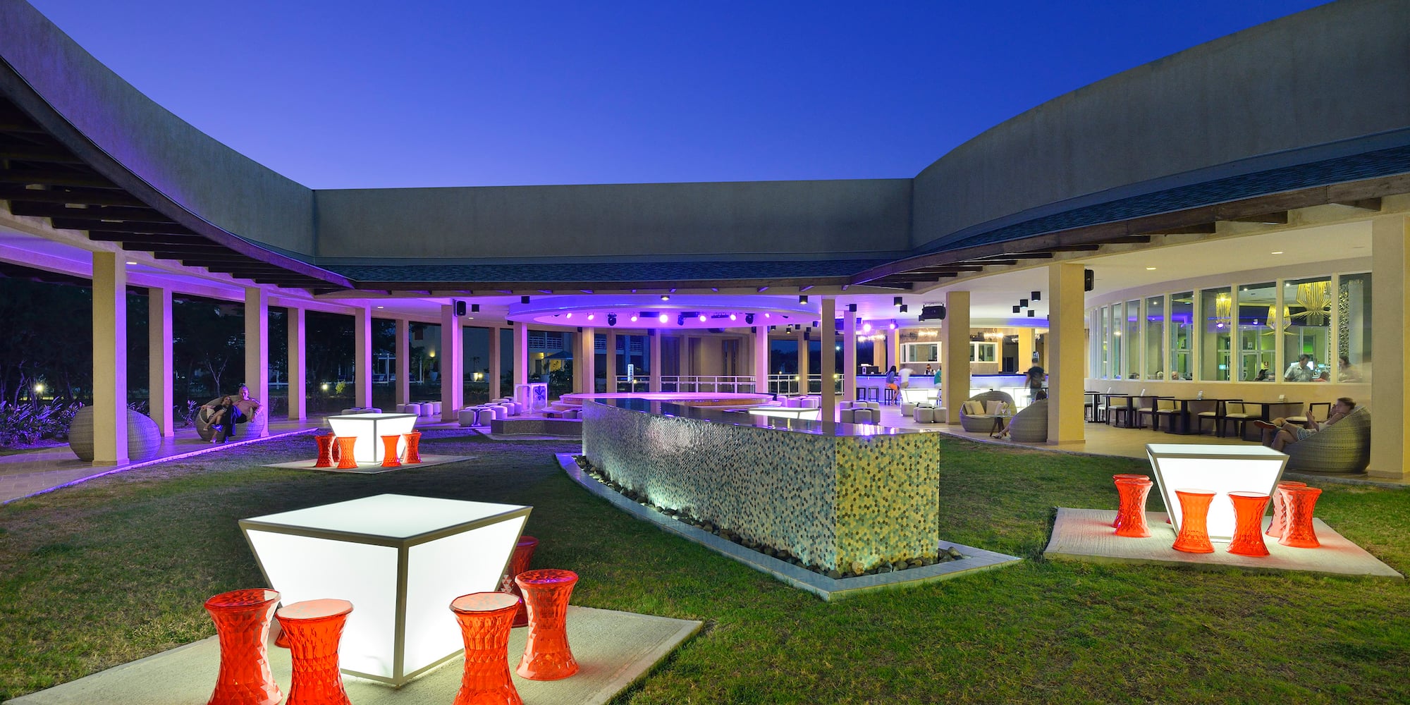 a building with a large patio and a large building with a large patio