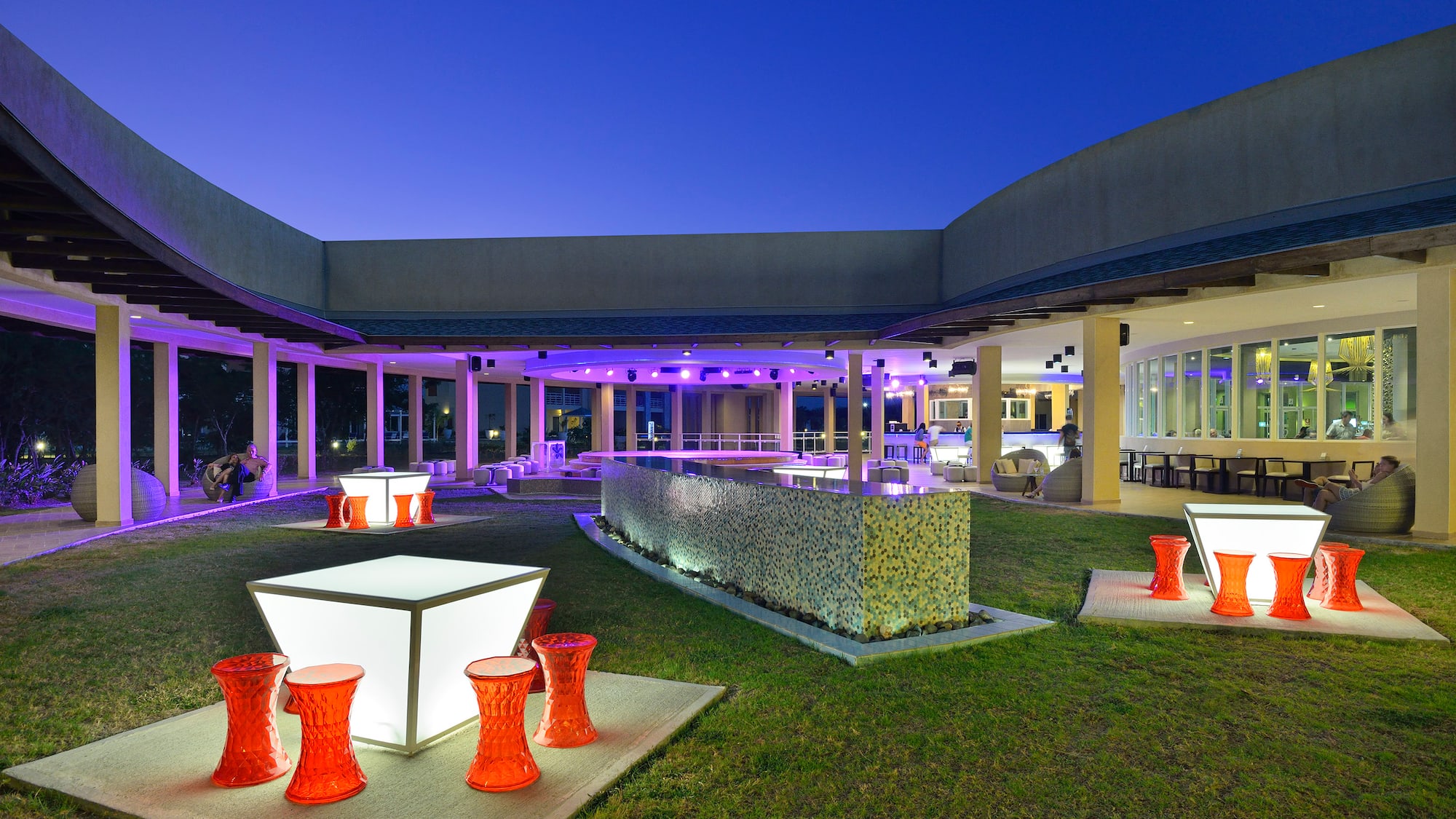 a building with a large patio and a large building with a large patio