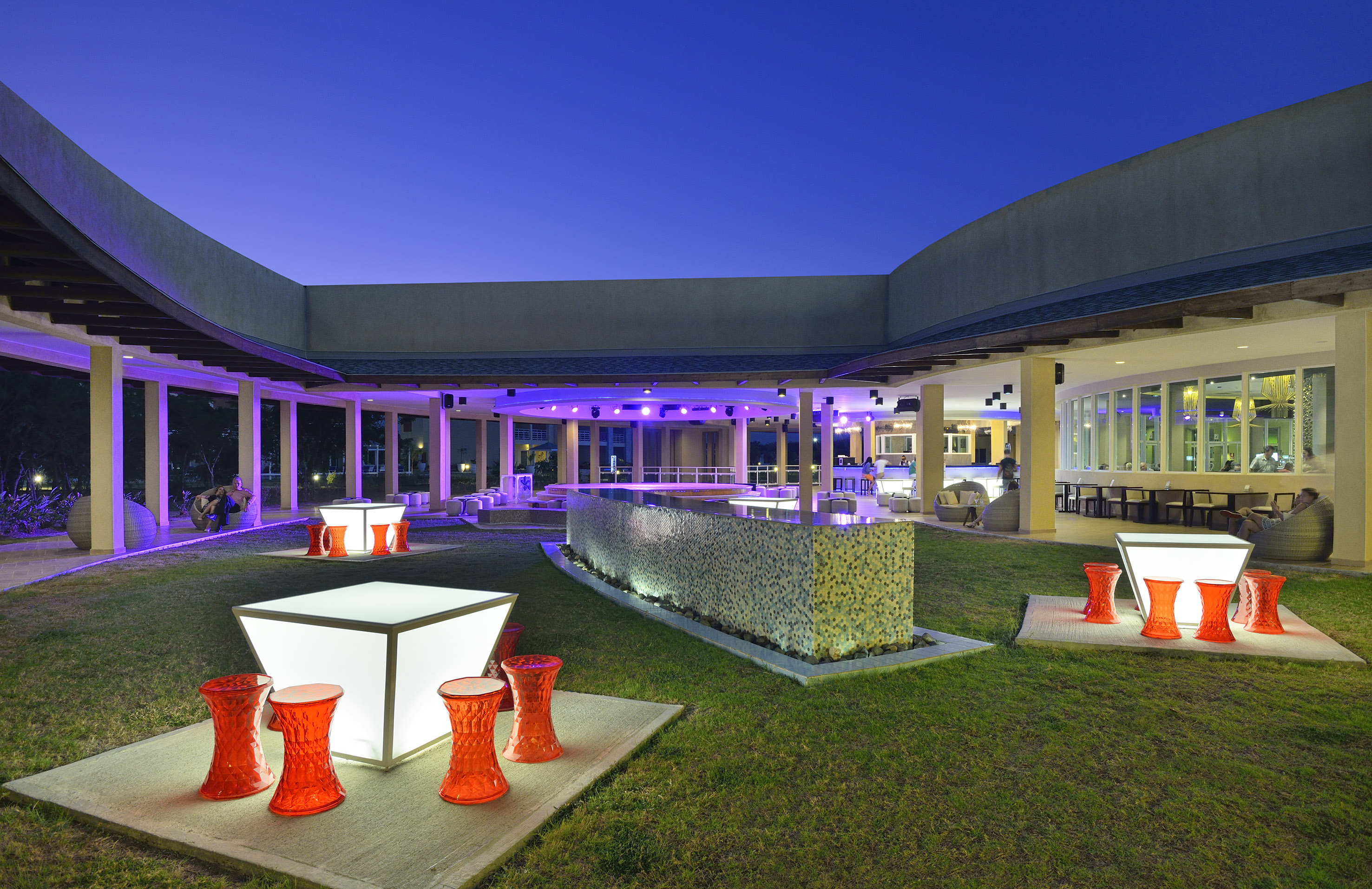 a building with a large patio and a large building with a large patio