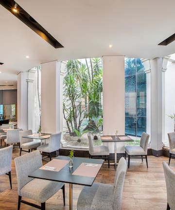 a room with tables and chairs