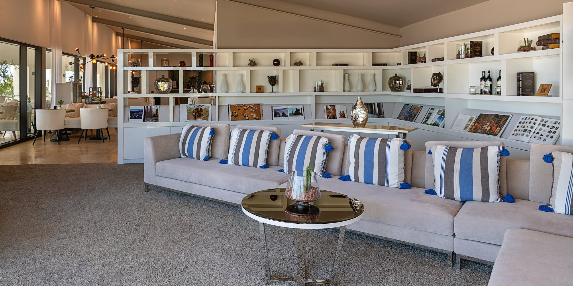 a room with a couch and shelves