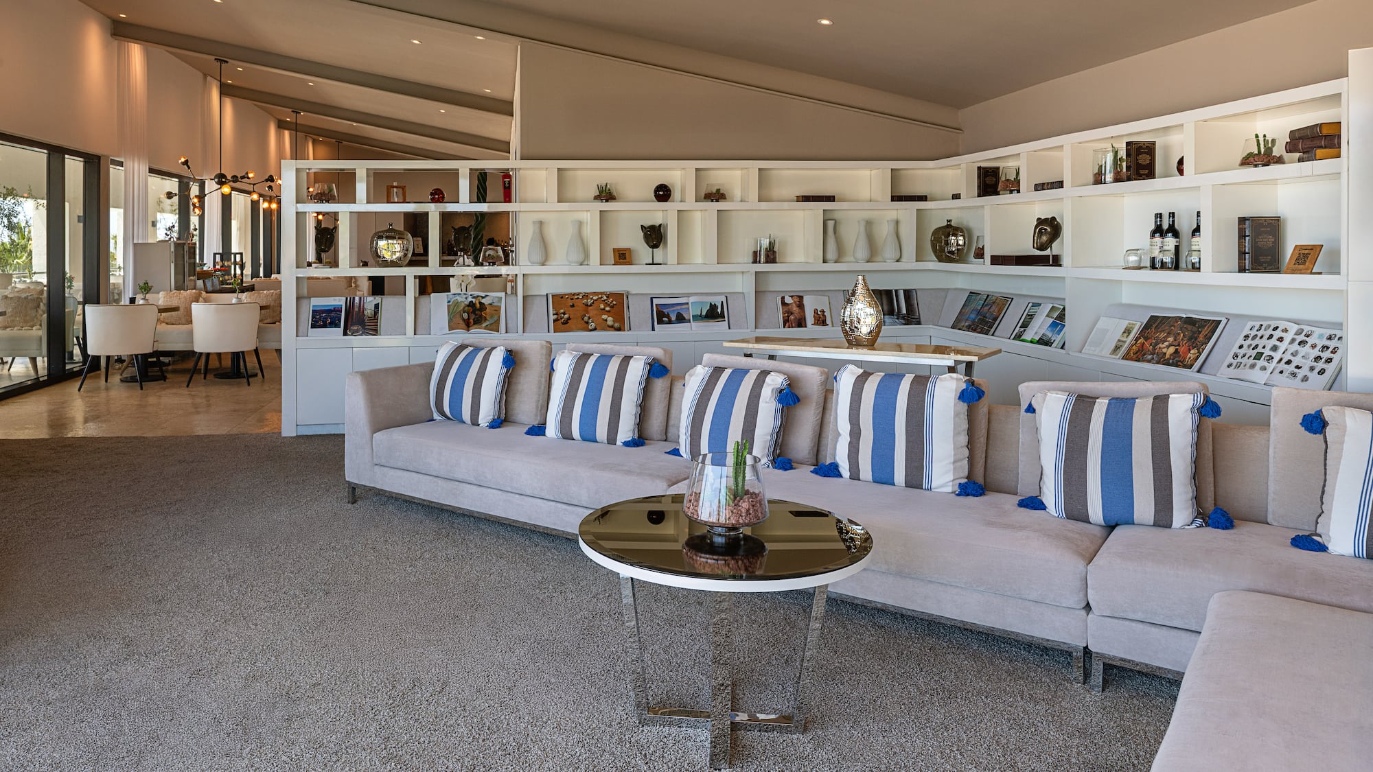 a room with a couch and shelves