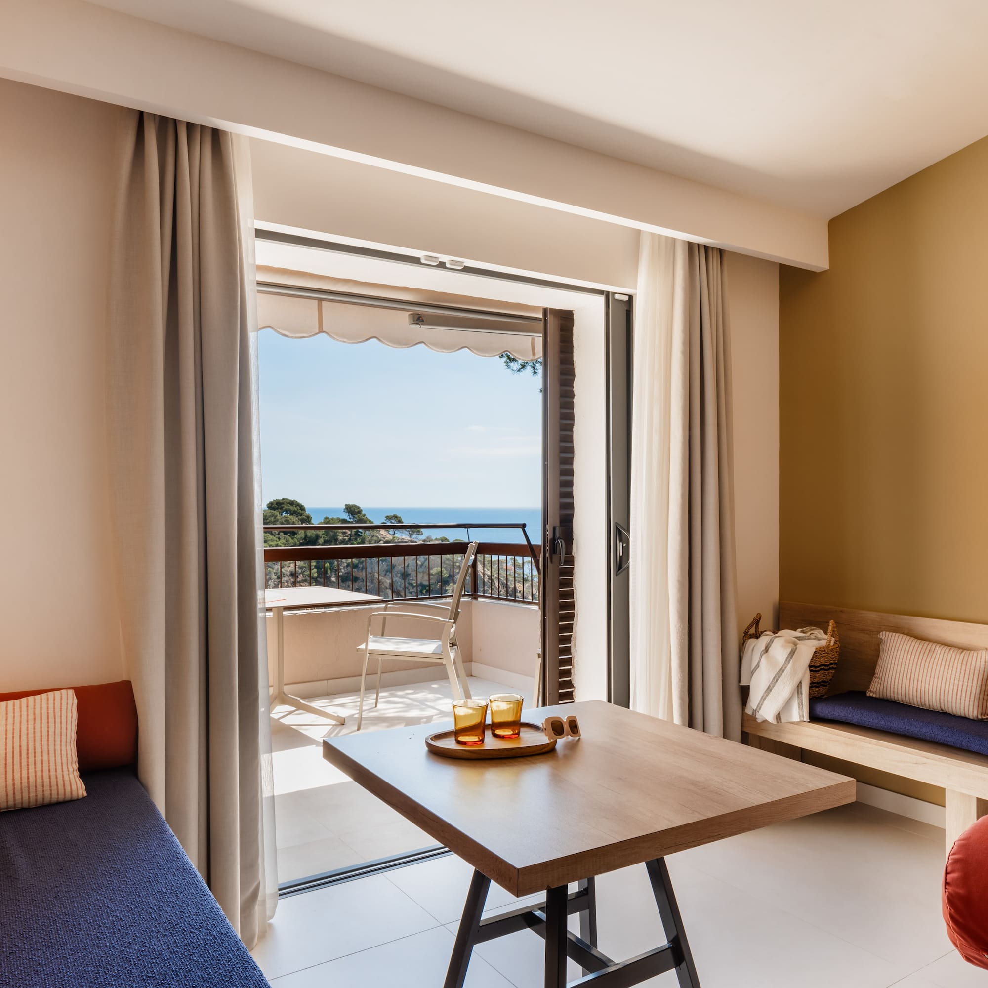 a room with a table and chairs