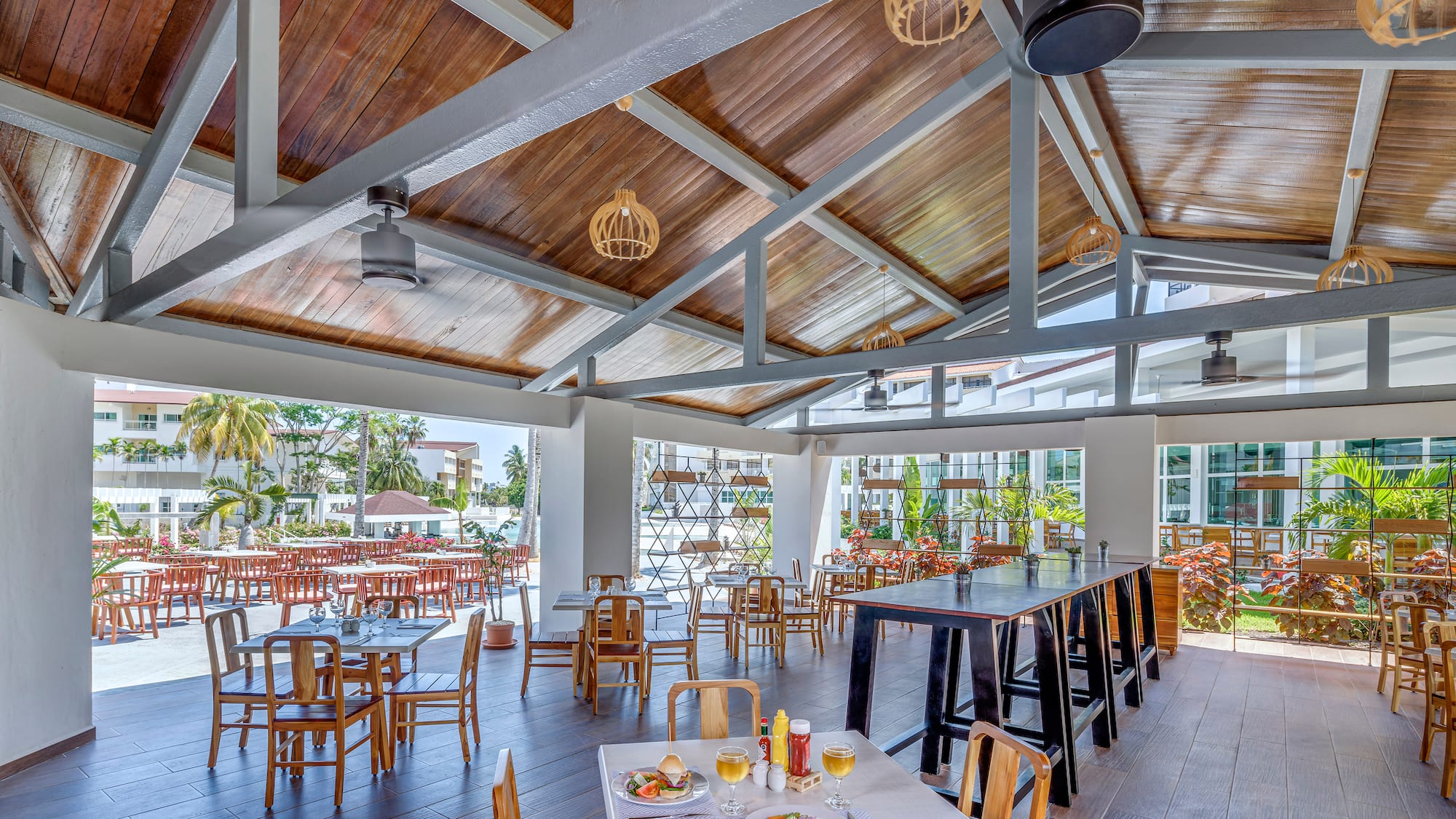 a restaurant with tables and chairs