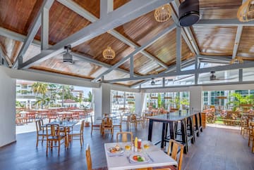 a restaurant with tables and chairs