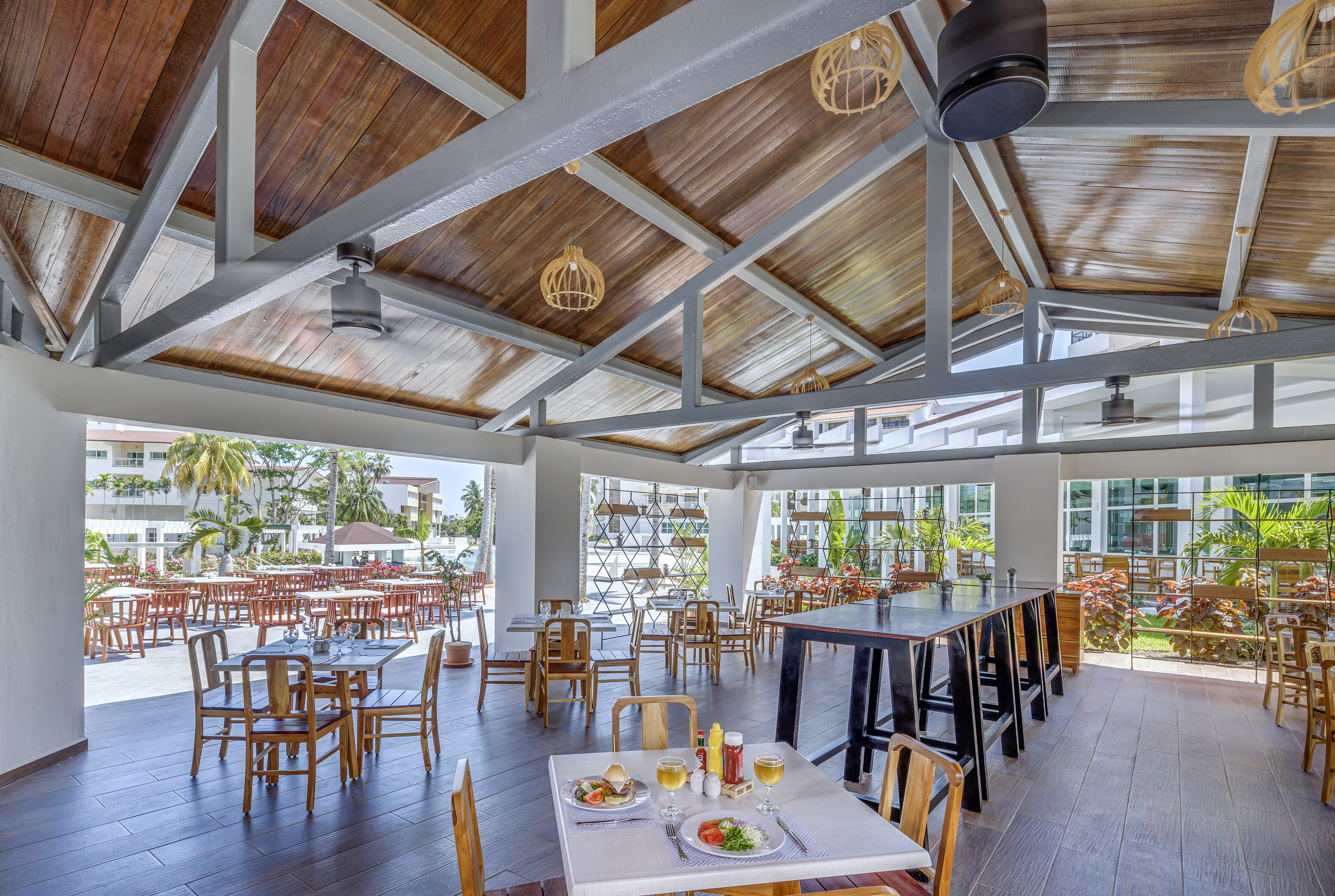 a restaurant with tables and chairs