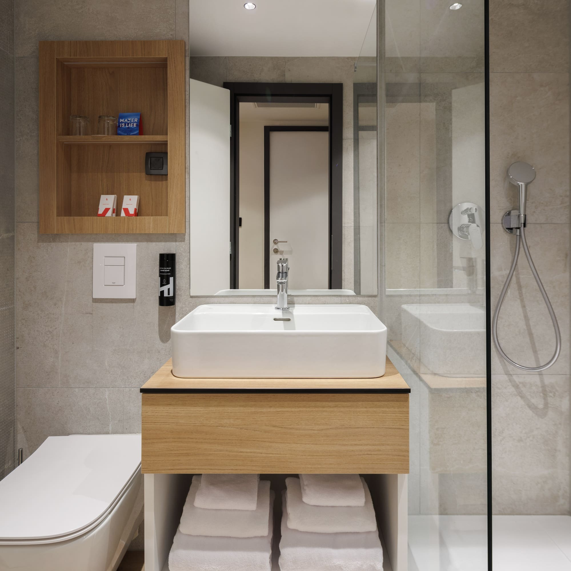 a bathroom with a sink and a shower