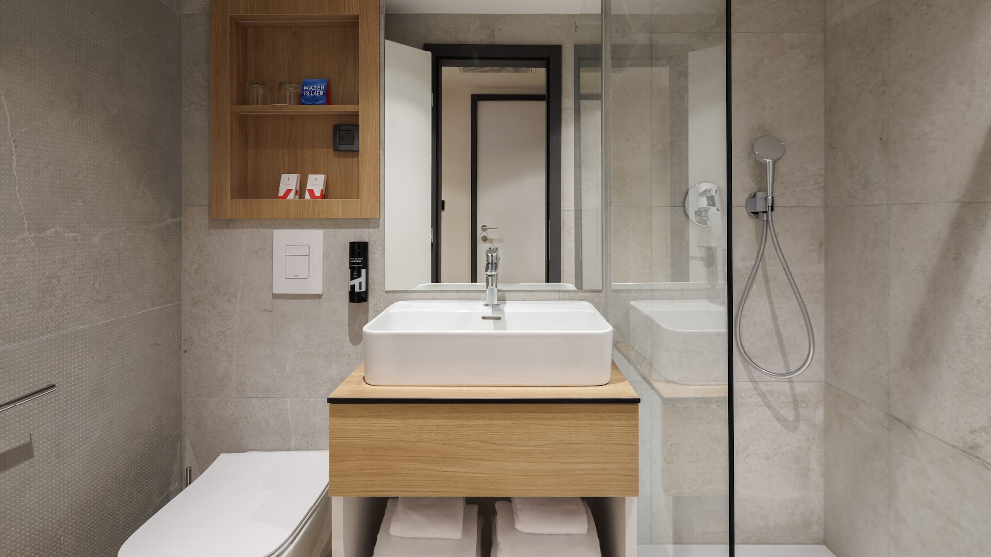 a bathroom with a sink and a shower