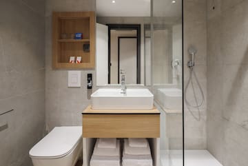 a bathroom with a sink and a shower
