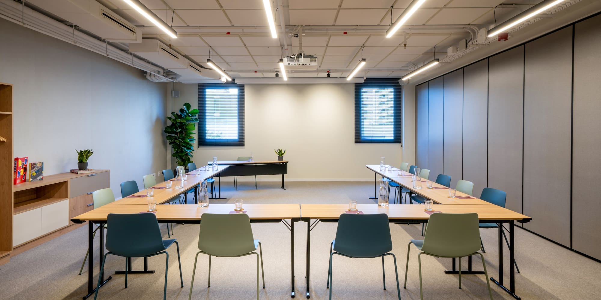 a room with tables and chairs