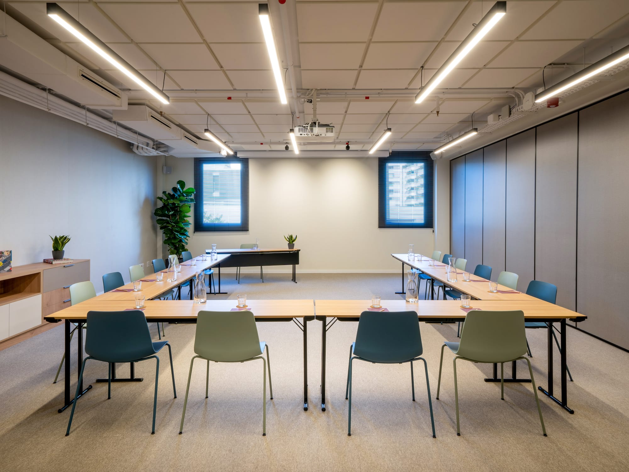 a room with tables and chairs