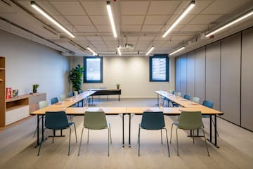 a room with tables and chairs