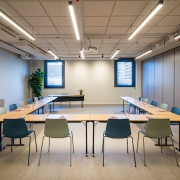a room with tables and chairs