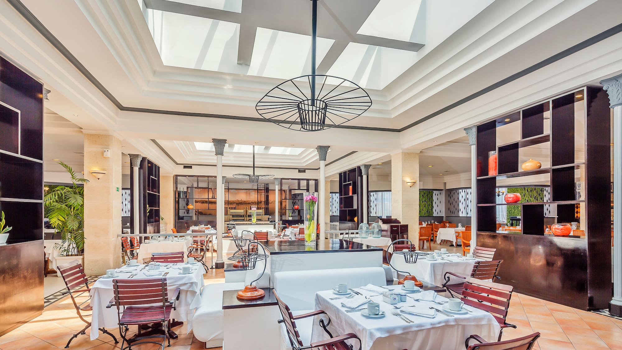 a room with tables and chairs