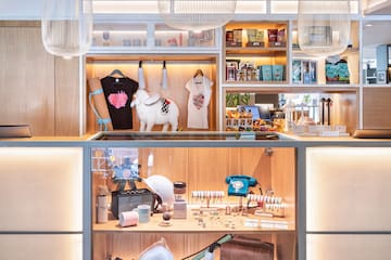 a display case with a sheep on it