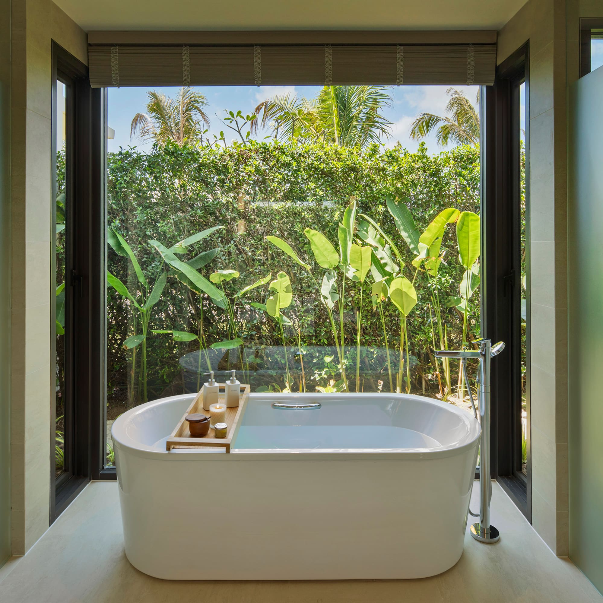a bathtub in a bathroom with a window