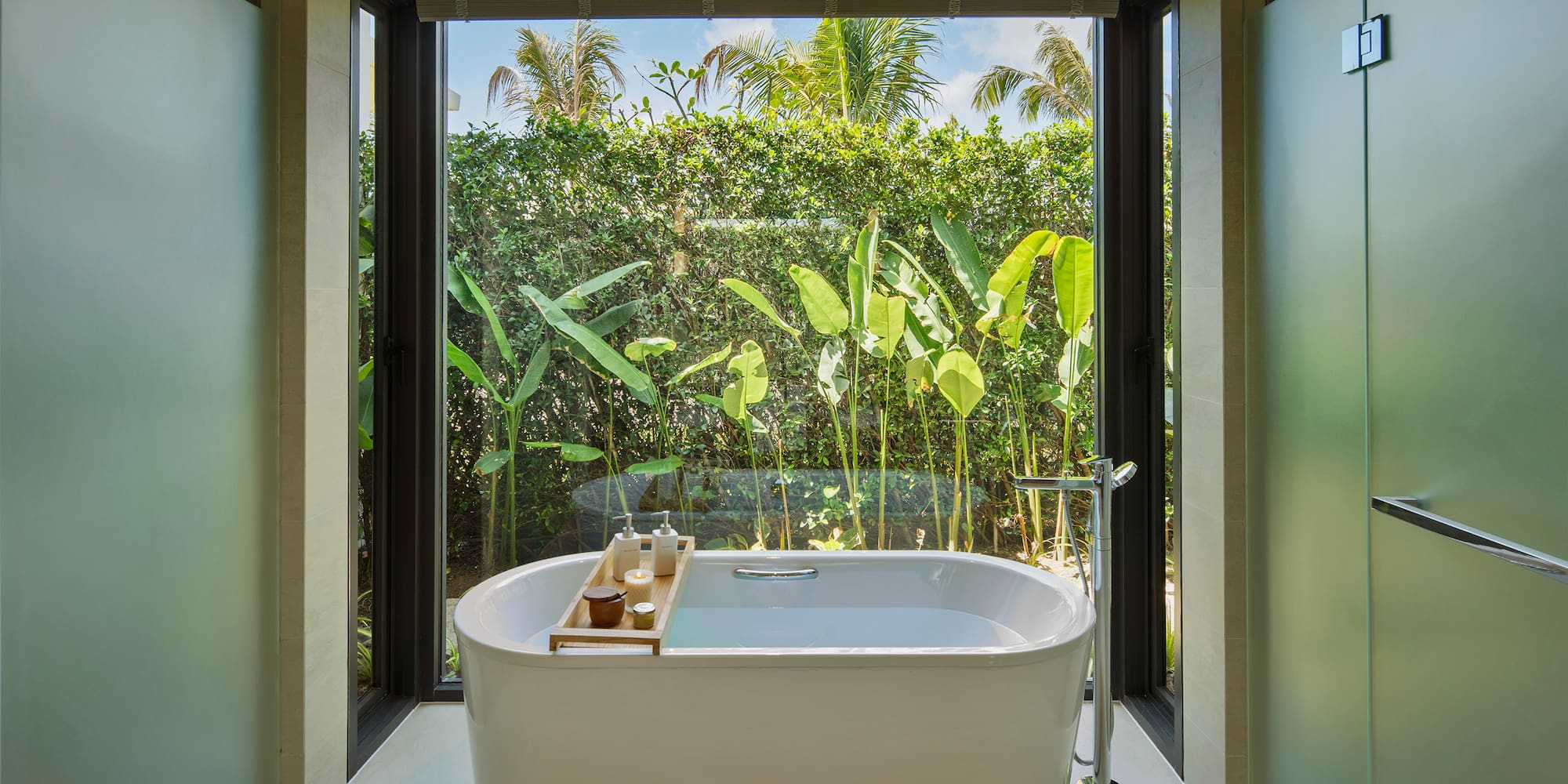 a bathtub in a bathroom with a window